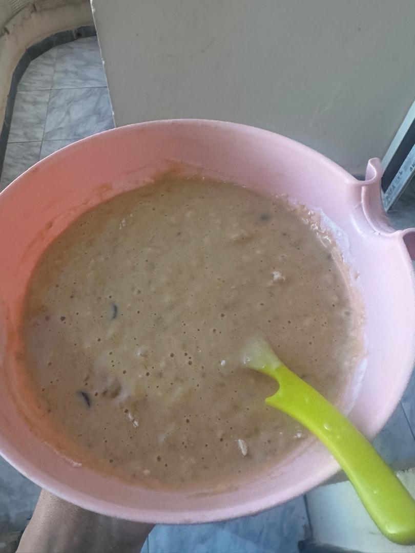 Final banana bread batter with chocolate folded in, ready to bake