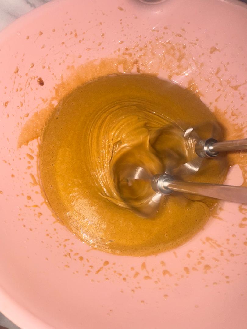 Eggs and sugar beaten with a hand mixer until light and smooth